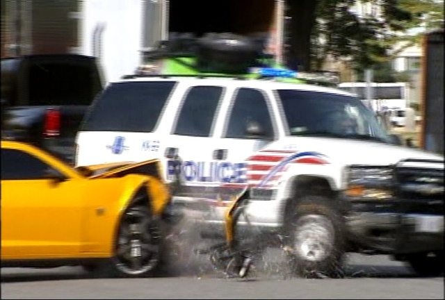 Cop Crashes into Set – Transformers Fail